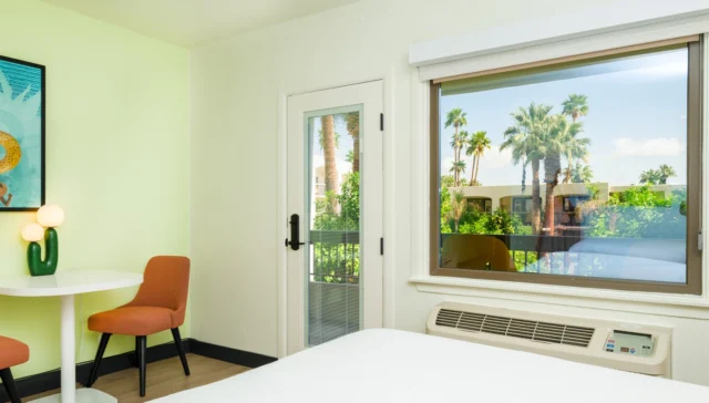 Palm trees framed perfectly from bed = instant vacation mode 🌴